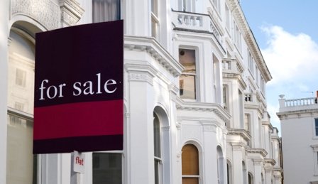 Regency building with For Sale sign